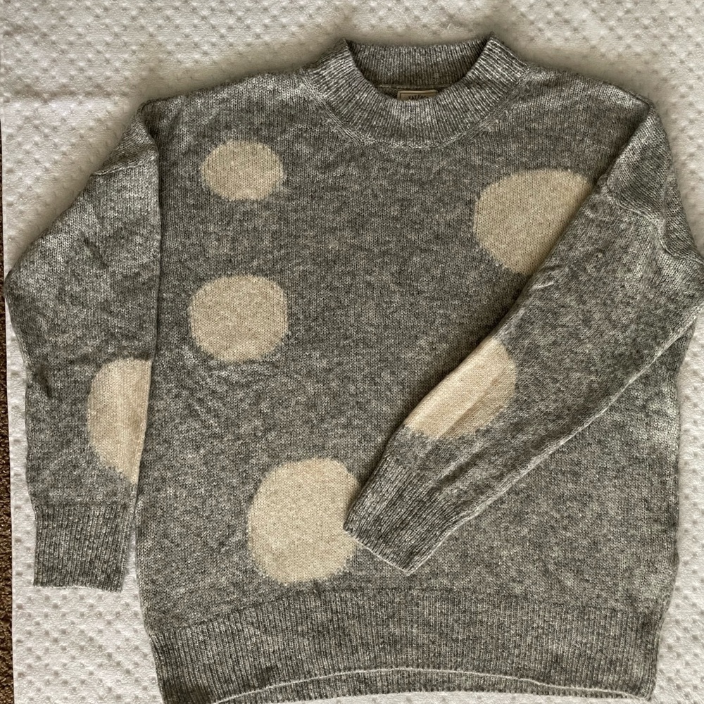 Cozy, fun grey and white polka dot sweater.